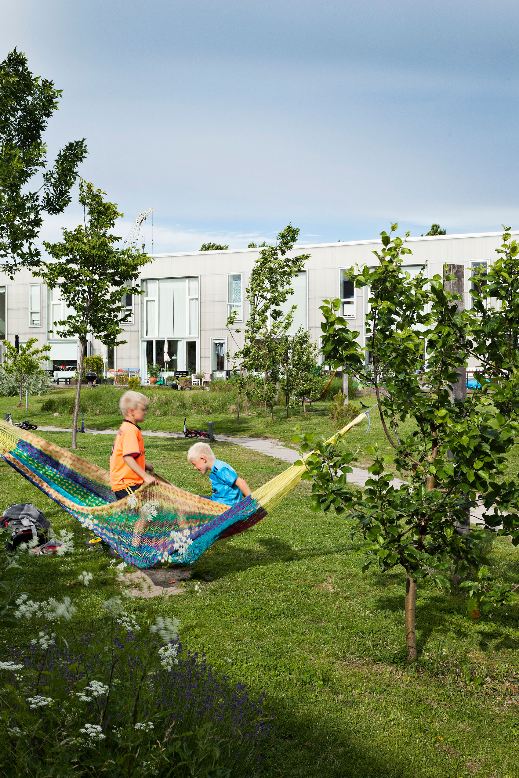 Lang Eng, Copenhagen. Designed by the architect Dorte Mandrup, this co-housing community includes a shared garden, a 20-seat cinema for collective film and TV watching and an industrial-sized kitchen where residents take turns to prepare shared meals.